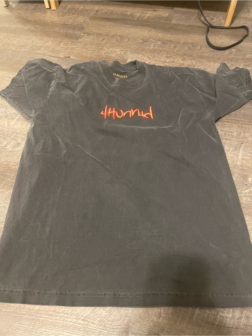 4Hunnid Men's Black Short Sleeve Crewneck T-Shirt with Red/Orange Logo